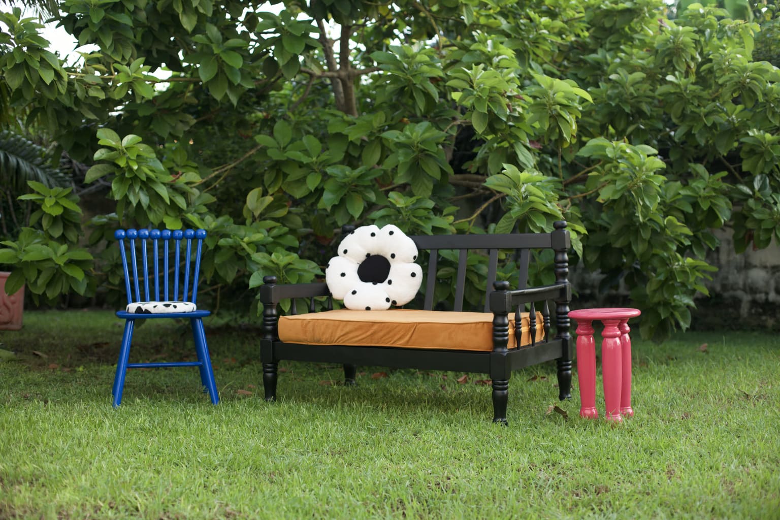 The Sankofa Project — restored chair, bench, and stool arranged outdoors